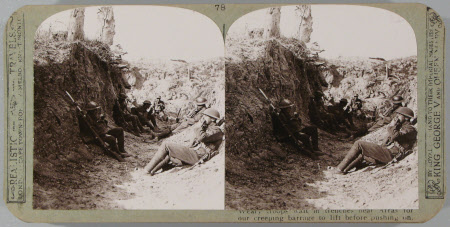 Weary troops wait in trenches near Arras for our creeping barrage to lift before pushing on.
