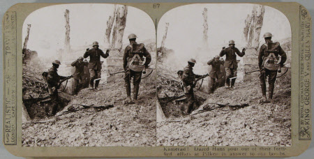 Kamerad! Dazed Huns pour out of their fortified cellars at Pilken in answer to our bombs.