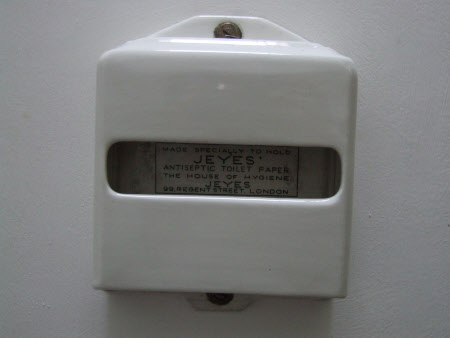 Lavatory paper dispenser
