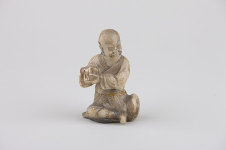 Netsuke of a seated man