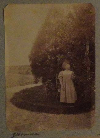 Gioconda Mary Hulton (1887-1940) in a Garden: 1893