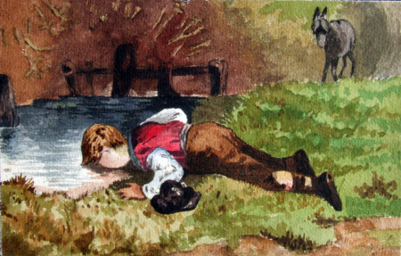 A Boy Drinking from a River