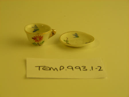 Doll's house cup and saucer
