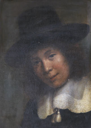 A Young Man in a Black Hat and White Lace Collar with Tassels