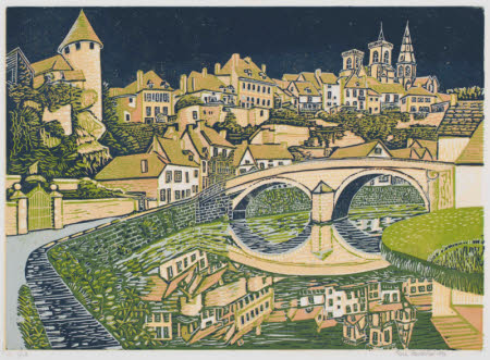 French town on a river with a large bridge