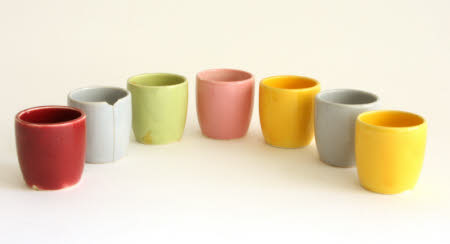 Seven pottery eggcups.