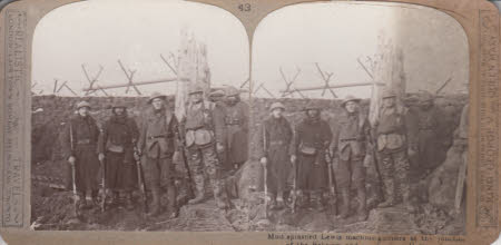 Mud splashed Lewis machine gunners at the junction of one Belgium and on times at Hollebeke.