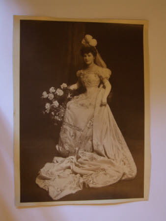 Photograph of Maud Kerr-Smiley posing in her wedding dress