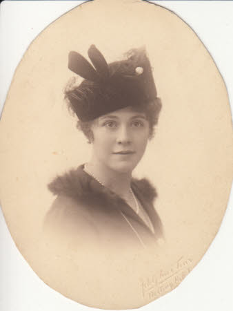 Portrait photograph of Maud Kerr-Smiley, oval, wearing hat
