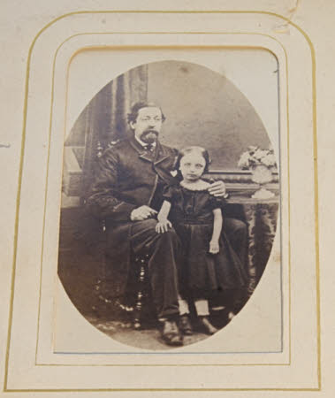 Mr [uncle] Laughton with a young child