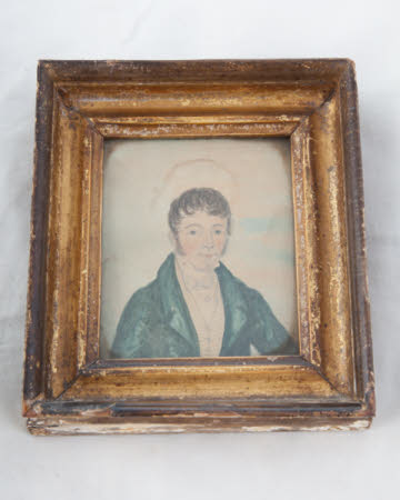 Man in blue-green coat