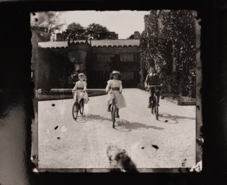 Left to right, on bicycles: The Hon. Constance Margaret Agar- Robartes (1890-1936),  The Hon. Edith ...