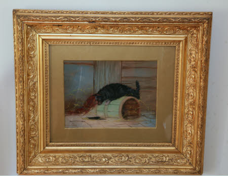 Terrier leaping over a barrel