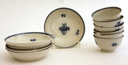 Six teabowls and five saucers.