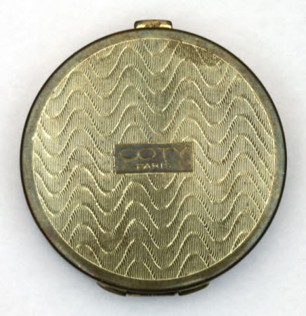 Powder compact