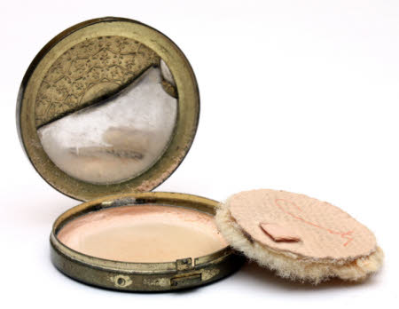 Powder compact