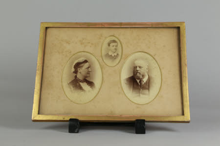 Unknown couple with their son