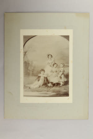 Four young children fishing