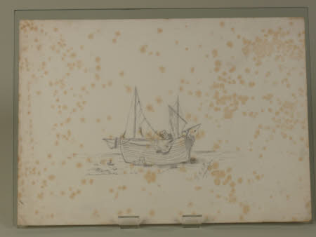 A wooden boat on a beach 