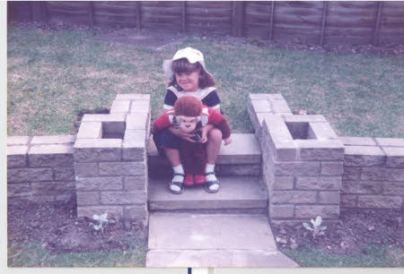 Sudbury Museum of Childhood.

Lucy with Cuthbert (her toy monkey) in 1983 aged 3 years. © National Trust / Helen Subden