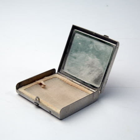Powder compact
