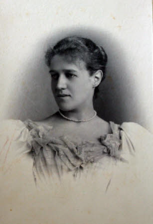 A head and shoulders portrait of a young woman.