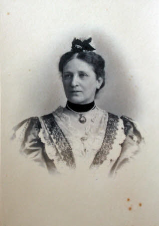 A head and shoulders portrait of a woman.