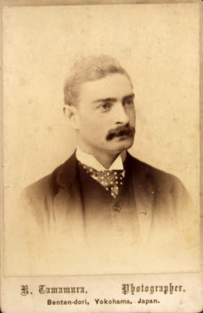 A head and shoulders portrait of a young man.