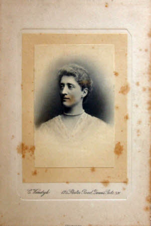A head and shoulders portrait of a woman.