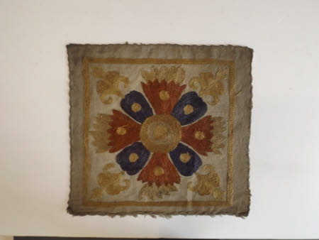 Embroidered mat