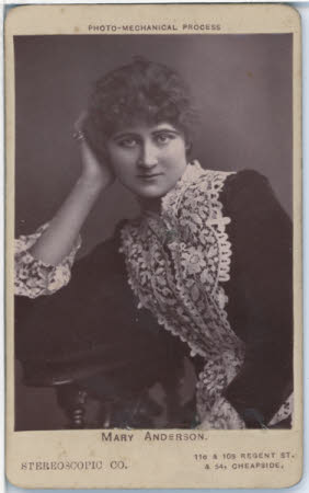 A monochrome photographic trade card with a photograph of MARY ANDERSON