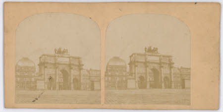 Ornamental archway with charioteer on top