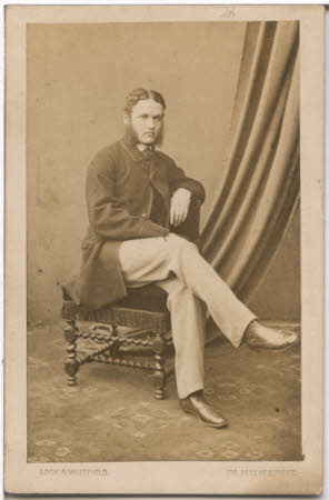 Portrait of an unknown man seated.