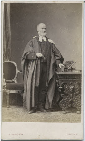 Portrait of an unknown bearded man in robes.