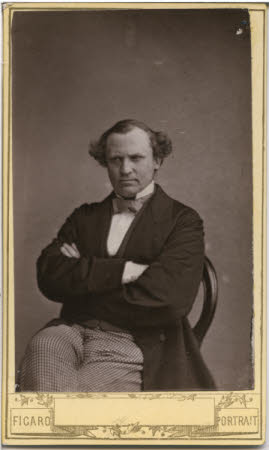Half length portrait of seated man