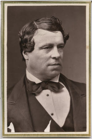 Half length portrait of gentleman in winged collar shirt