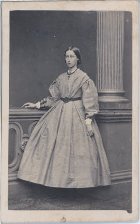 A full length portrait of a lady