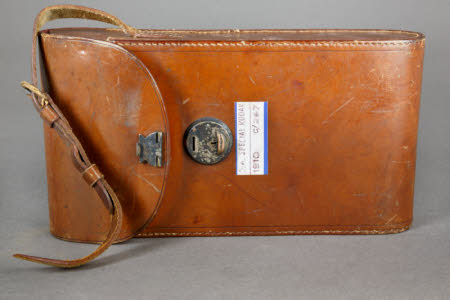 Brown leather case with hand strap
