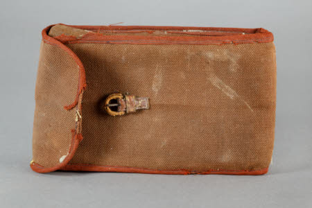 A brown canvas case for a Challenge Dayspool Tropical folding rollfilm camera
