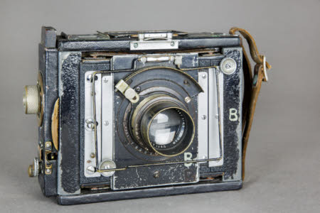 Van Neck Press Camera - strut folding plate hand camera.