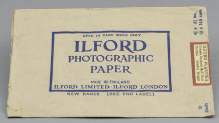 A brown paper envelope (empty and unsealed) for Ilford Plastika Photographic Paper.