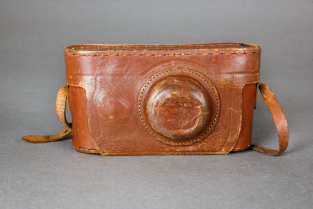 A fitted leather camera case for the Argus C2 camera.
