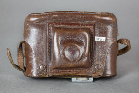 A leather fitted camera case for Mercury II camera.