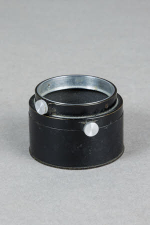 A Lens hood for Leica camera.