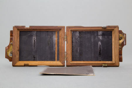 Double photographic plate holder for folding field camera, quarter plate size, with two dark slides