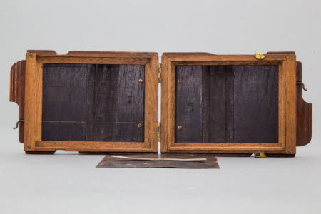 Double photographic plate holder for folding field camera, quarter plate size, with two dark slides