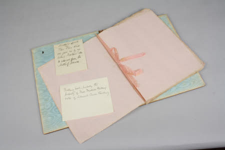 An olive wood blotting book