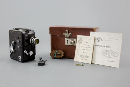 A Dekko 9.5mm cine camera in a leather case.