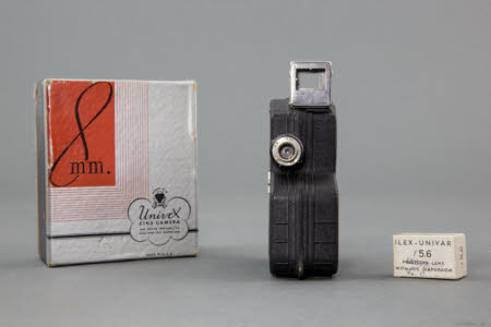 A Univex cine camera in original cardboard box.