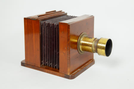 A wet plate camera and stand.